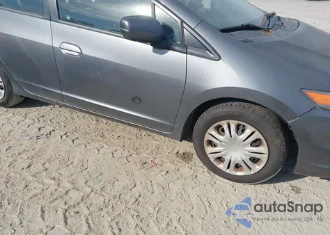 2011 Honda Insight z USA, uszkodzony, nr VIN JHMZE2H36BS008807